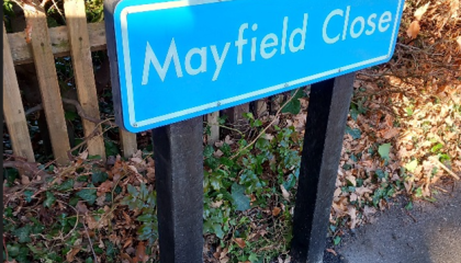 Image of a new blue street sign for Mayfield Close