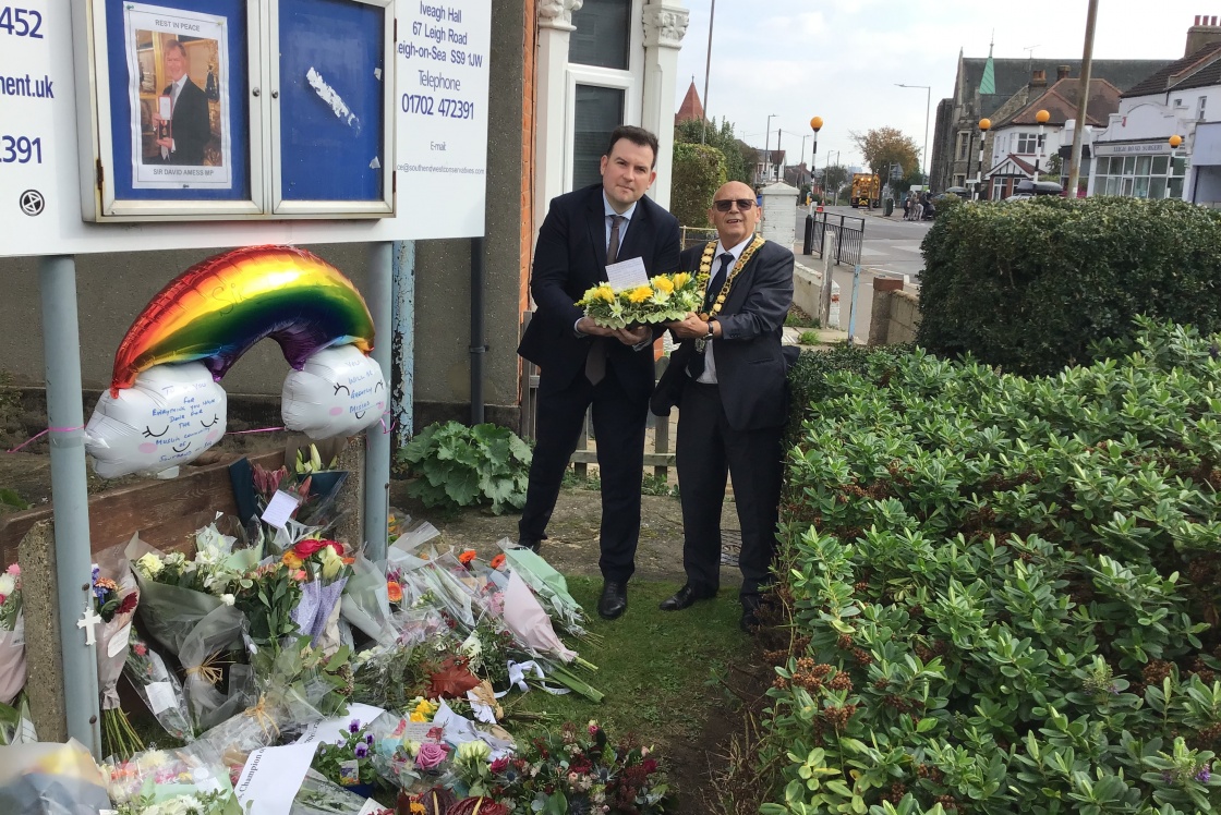 Image of Councillor Charles and Councillor Souter with Harlow Council’s wreath for Sir David Amess MP