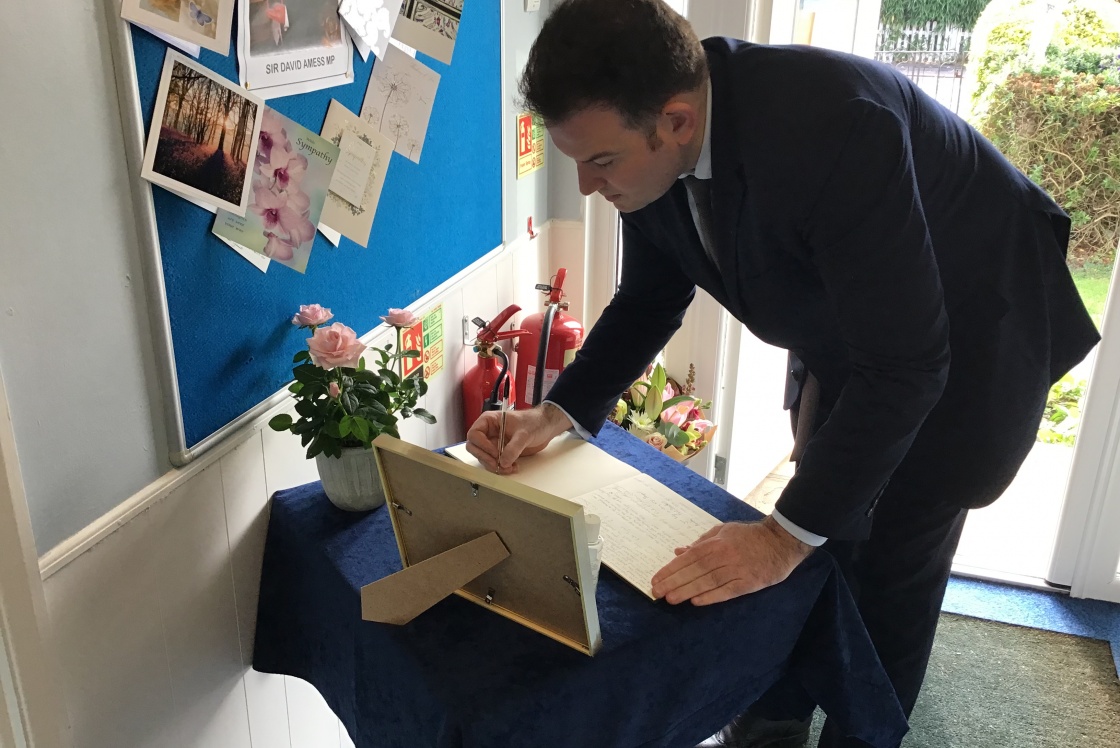 Councillor Charles signs the book of condolence for Sir David Amess MP Councillor Joel Charles signing the book of condolence for Sir David Amess MP