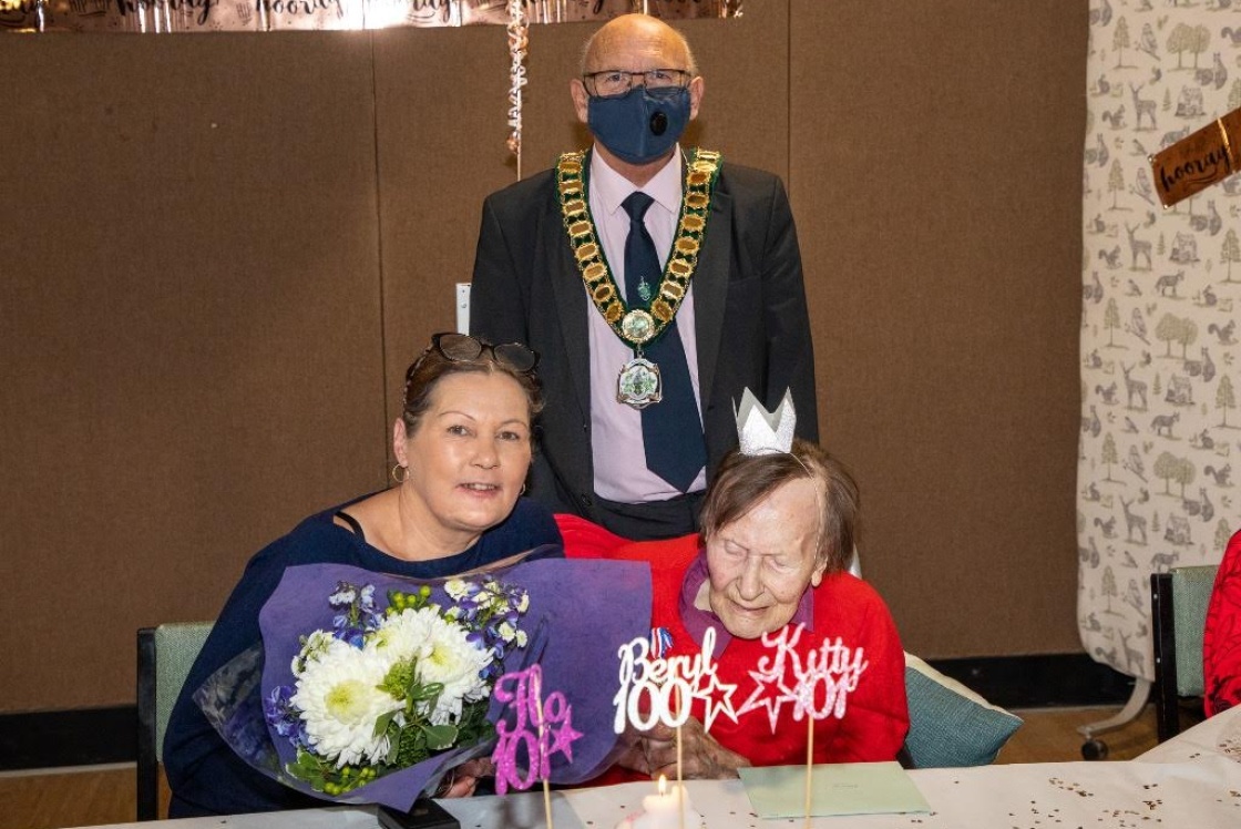 Image of Beryl and family with the Chair of Harlow Council 