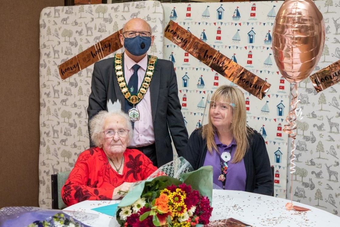 Image of Kitty with Chair of Harlow Council and staff member
