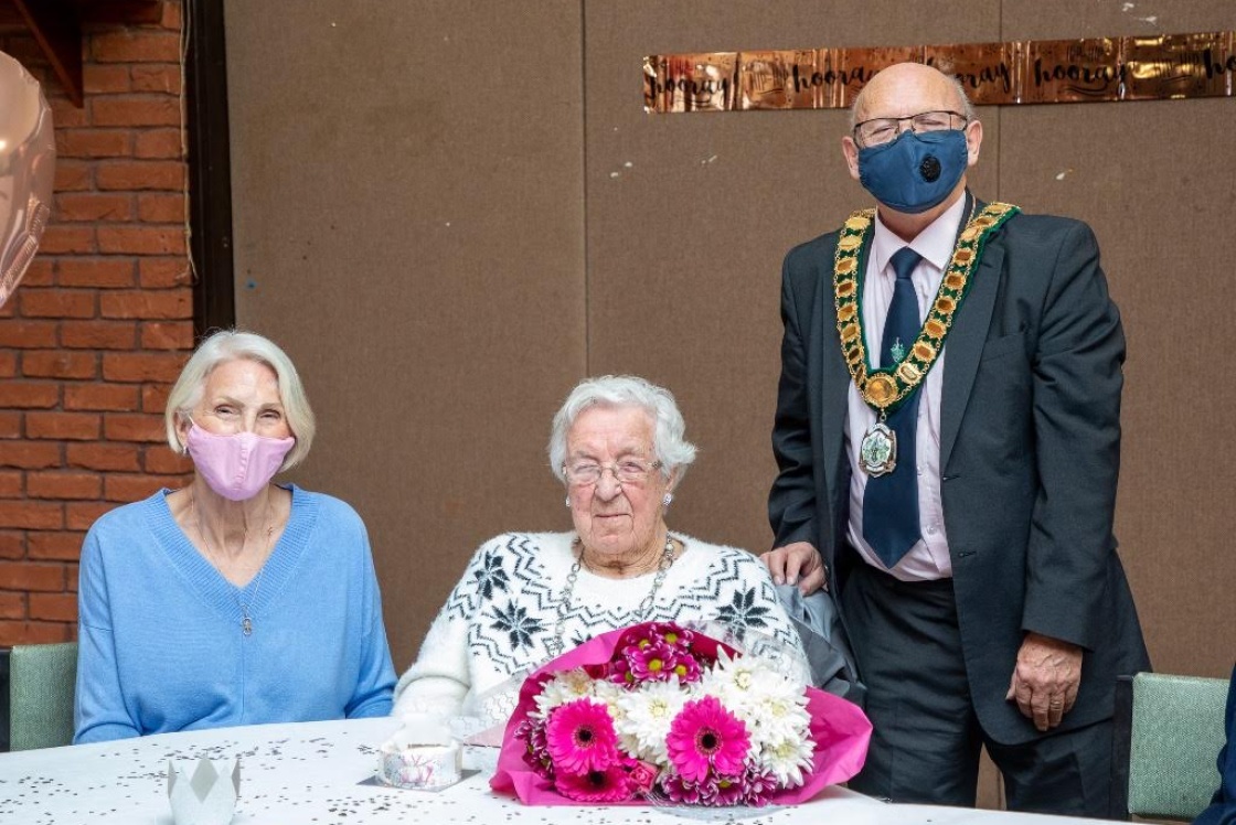 Image of Florence with family and the Chair of Harlow Council 