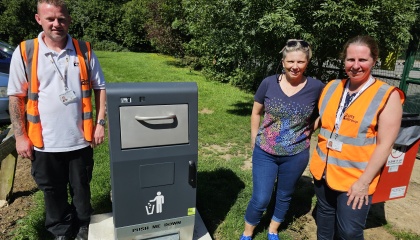 Cllr Nicky Purse with colleagues from HTS and one of the new bins at Minton Lane in Church Langley