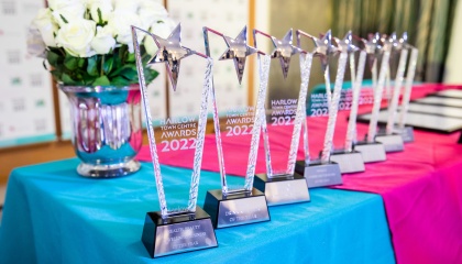 Image of the Harlow Town Centre awards 2022 trophies lined up on a table 