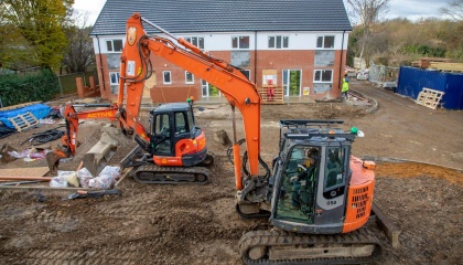 Image of construction digger on site in Bushey Croft 