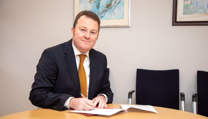 Image of Councillor Russell Perrin, Leader of the Council, at his desk in the Civic Centre