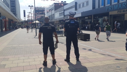Community Safety Officer with police officer in Harlow town centre