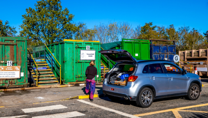 A person at a recycling centre