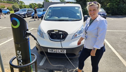 Councillor Nicky Purse charging an electric vehicle at Minchen Road car park