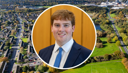 Image of Councillor Dan Swords with an aerial image of Harlow in the background