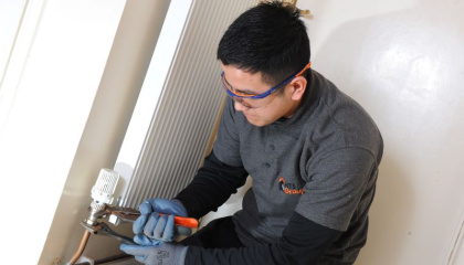 Staff carrying out a repair