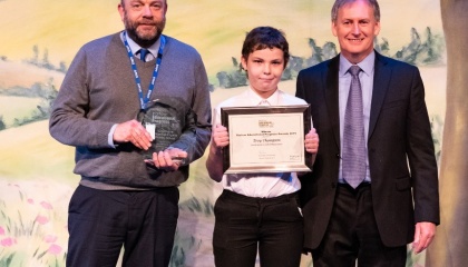 Jonathon Tye and Troy Thompson with their awards and John Keddie