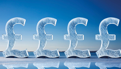 image of four frozen pound (£) signs 