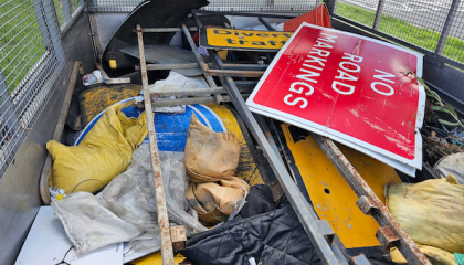 Image of old road signs and clutter removed from the streets 