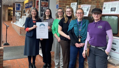 Image of museum staff celebrating accreditation status 